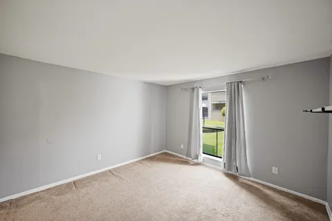 a view of an empty room with window