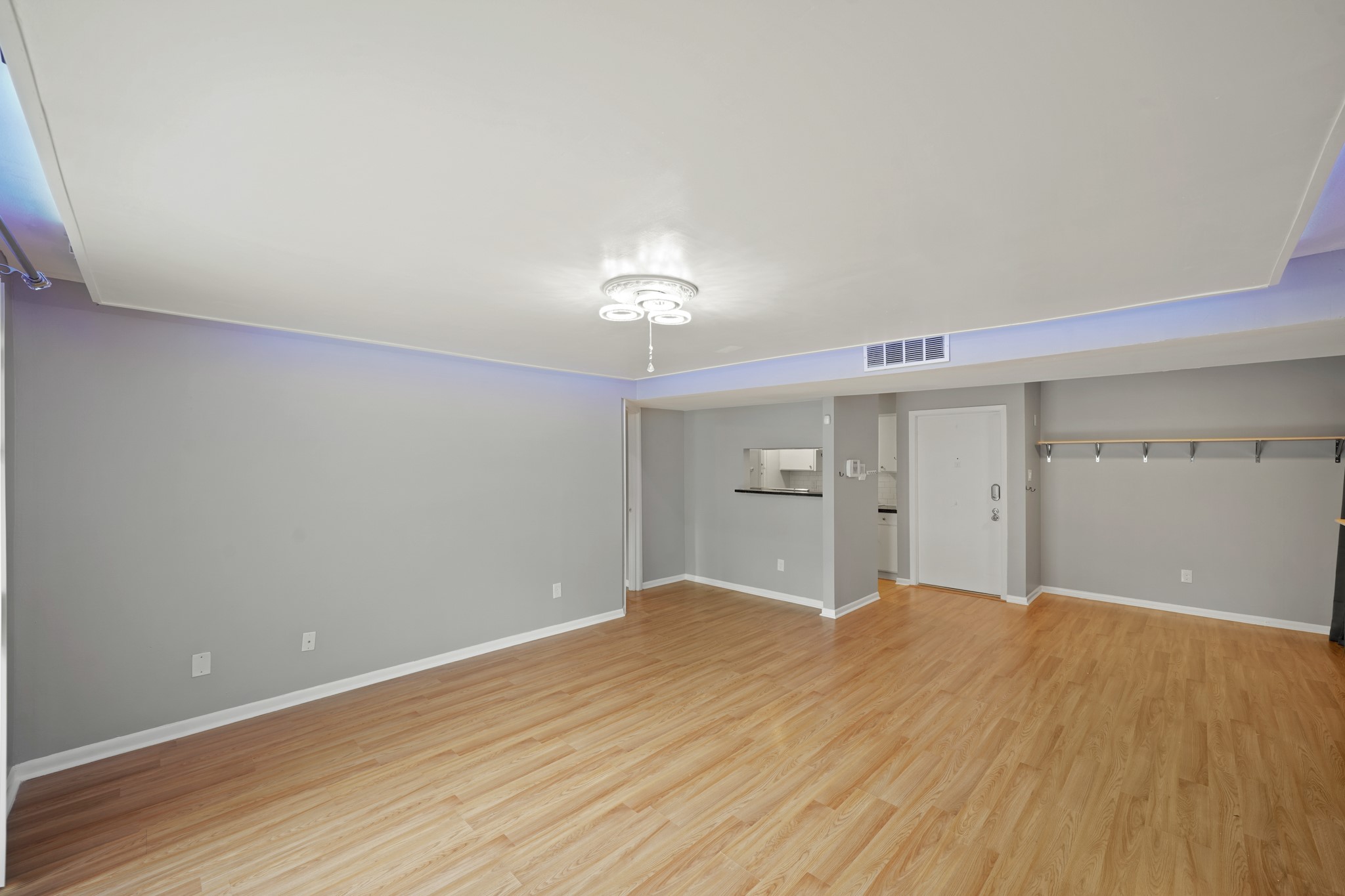 8517 Hearth Drive, Unit 5 Houston, TX 77054 - Photo 3 of 20 a big room with wooden floor and natural light