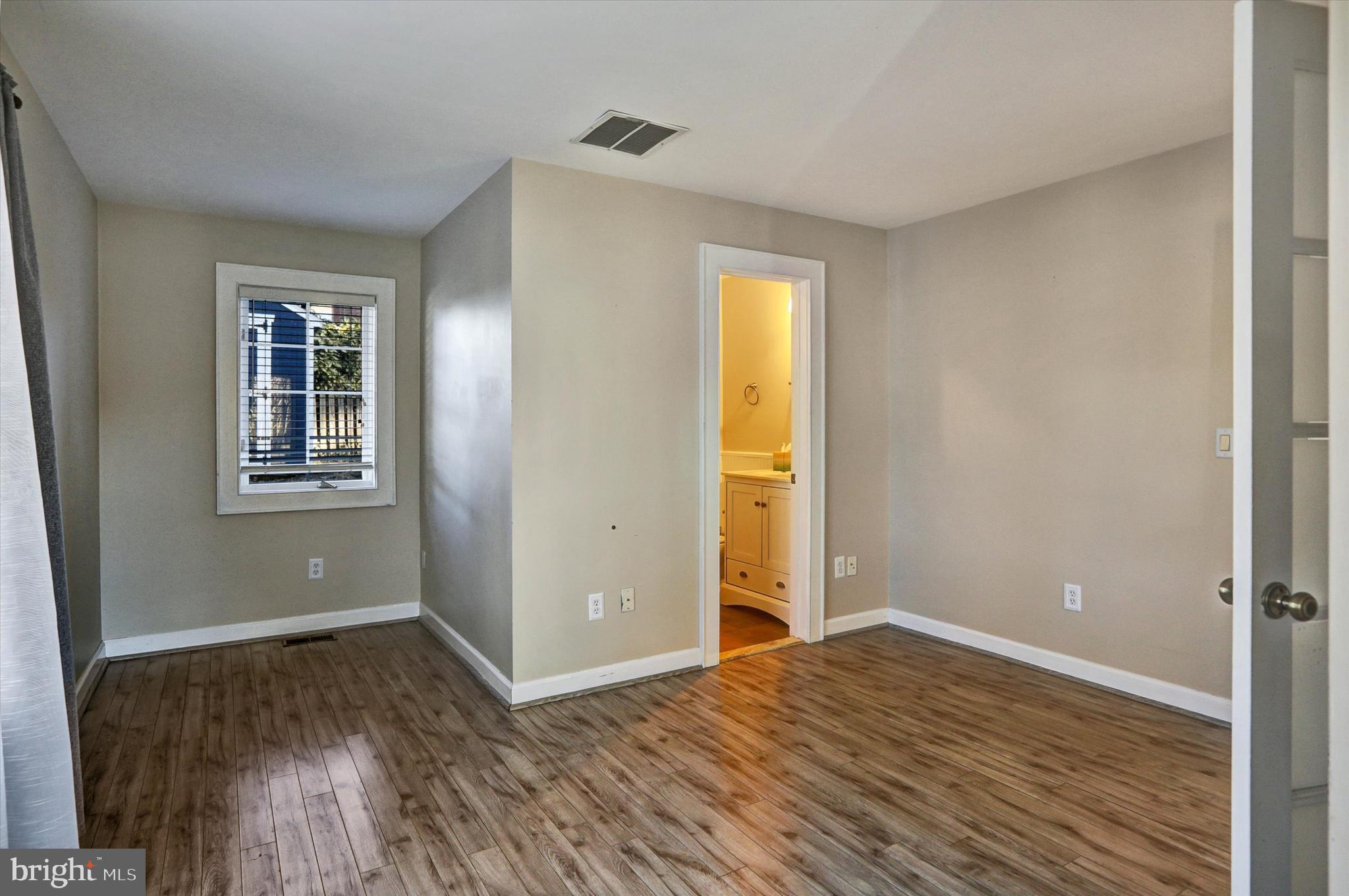 722 Genessee Street Annapolis, MD 21401 - Photo 16 of 42 a view of empty room with wooden floor and fan