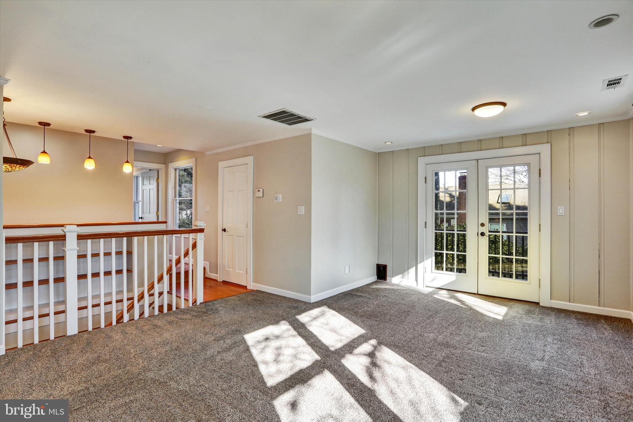 722 Genessee Street Annapolis, MD 21401 - Photo 23 of 42 a view of a big room with windows and entryway
