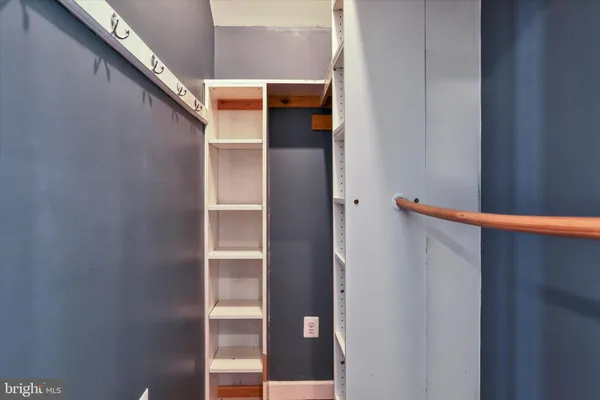 a view of a room that has a window in it