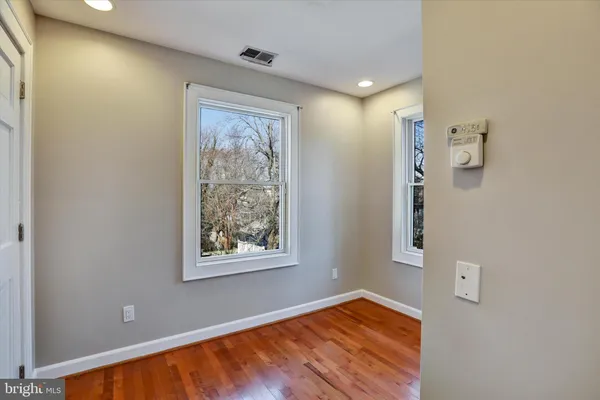 a view of a bathroom from the hallway