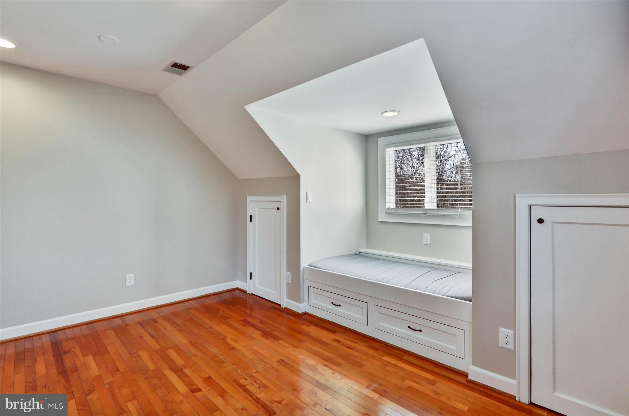 722 Genessee Street Annapolis, MD 21401 - Photo 35 of 42 wooden floor in an empty room with a window