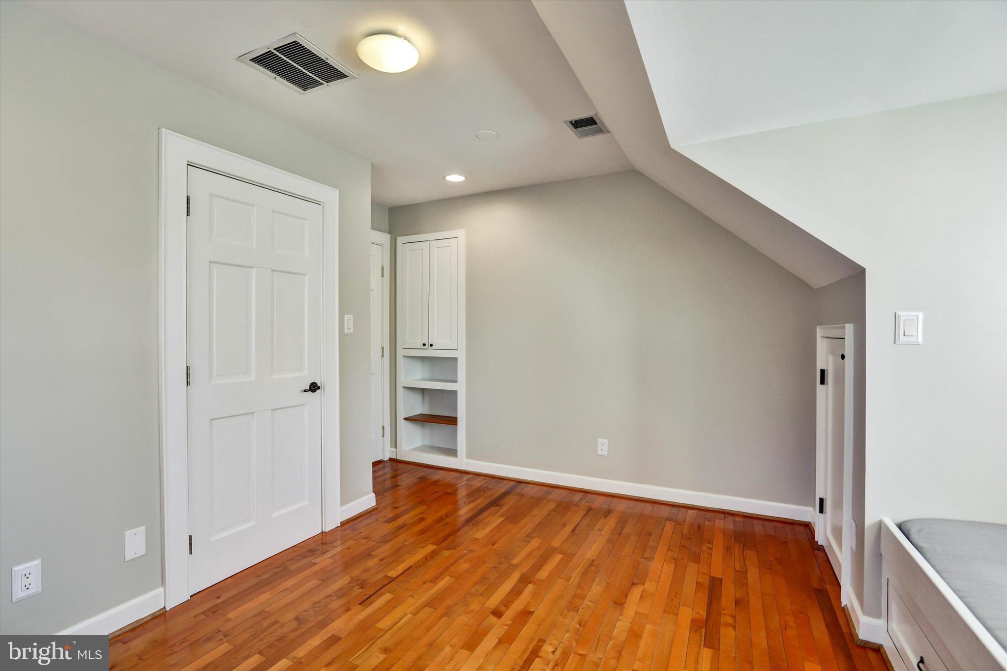 722 Genessee Street Annapolis, MD 21401 - Photo 36 of 42 a view of room with wooden floor and closet