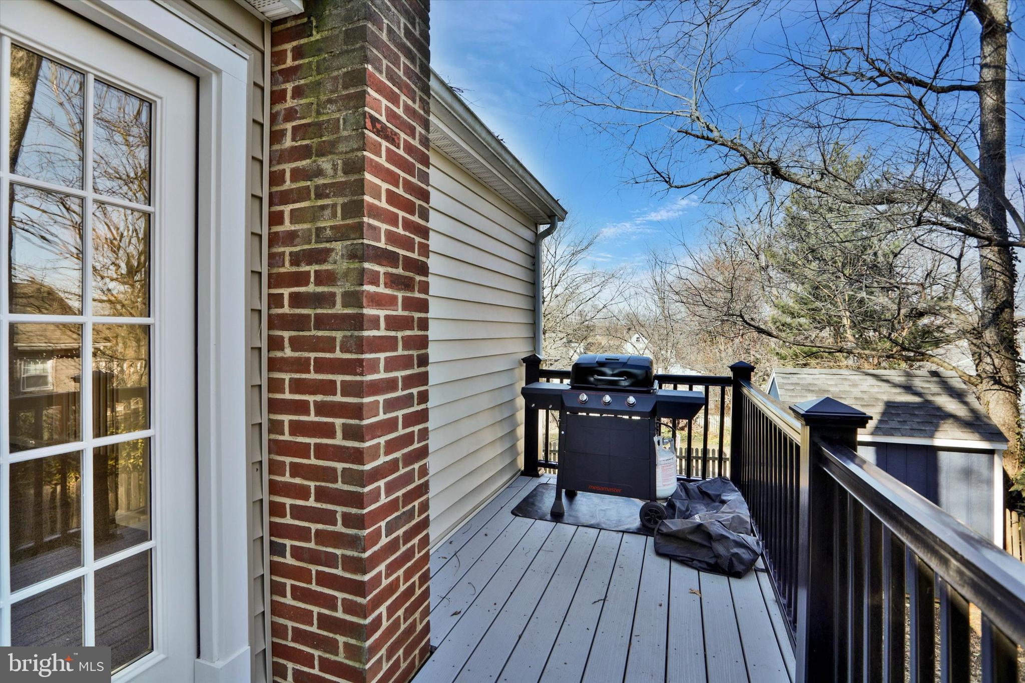 722 Genessee Street Annapolis, MD 21401 - Photo 38 of 42 a view of a balcony with chairs and wooden floor