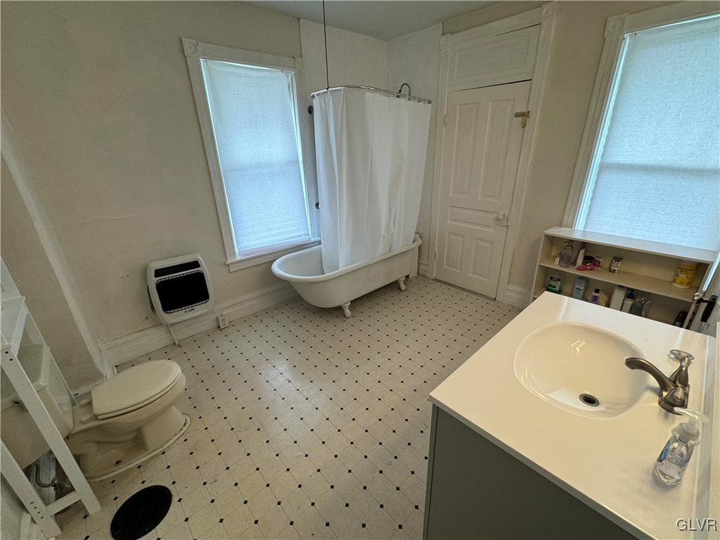 128 Center Street Slatington, PA 18080 - Photo 7 of 9 a bathroom with a sink a toilet and shower