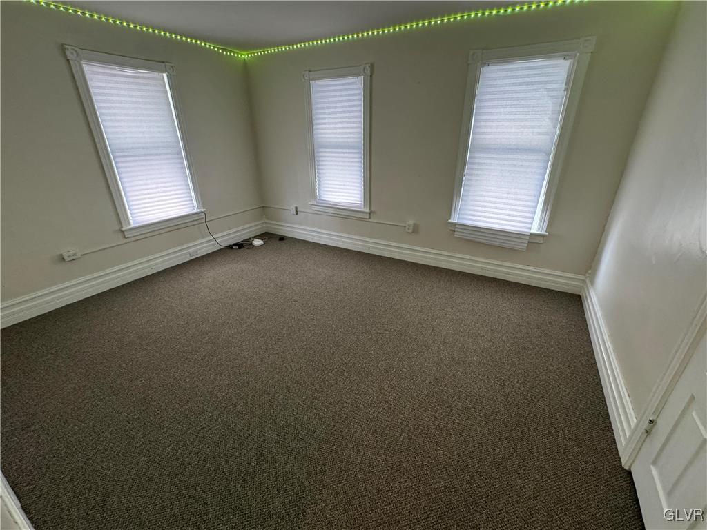 128 Center Street Slatington, PA 18080 - Photo 9 of 9 an empty room with windows