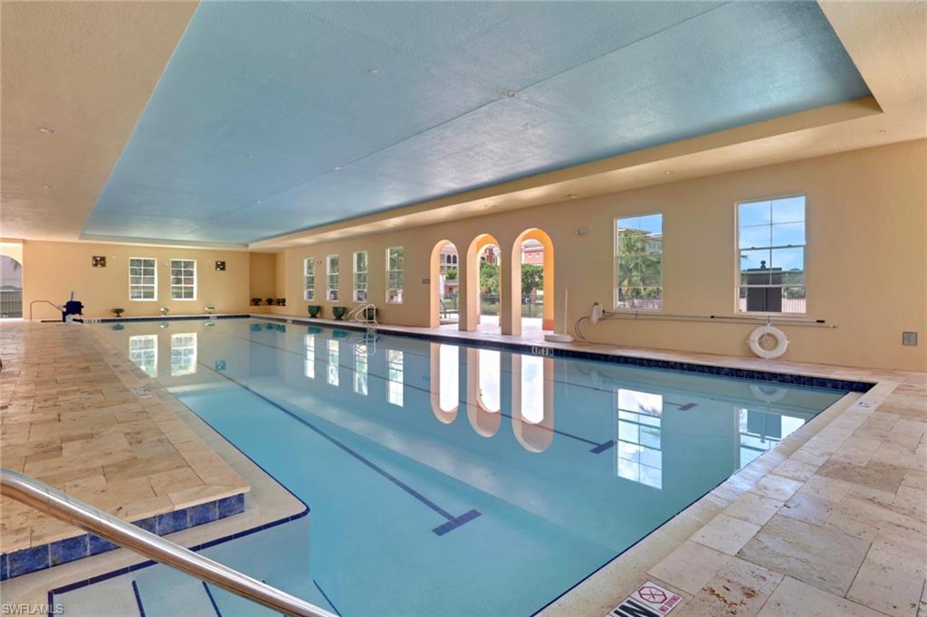 21450 Strada Nuova Circle, Unit A301 Estero, FL 33928 - Photo 35 of 40 a view of a living room and dining room