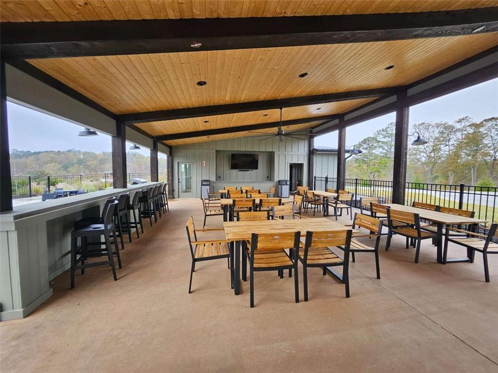 0 Canoe Way Talking Rock, GA 30175 - Photo 12 of 18 a view of a dining room with furniture window and outside view
