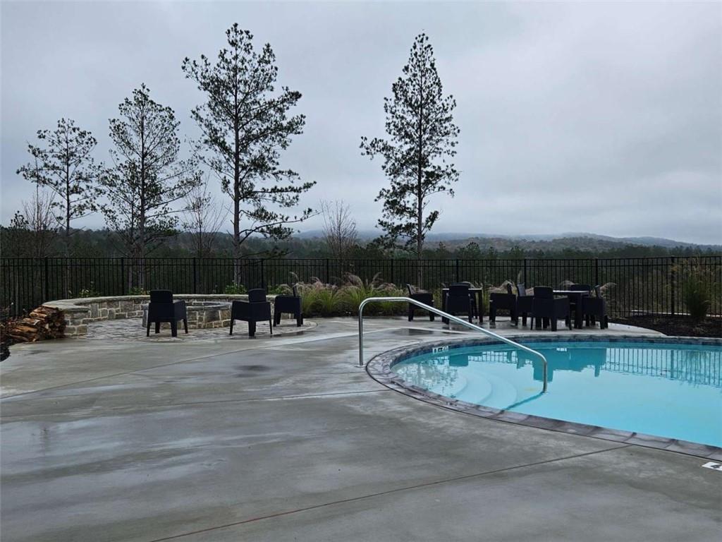 0 Canoe Way Talking Rock, GA 30175 - Photo 13 of 18 a view of swimming pool with seating space