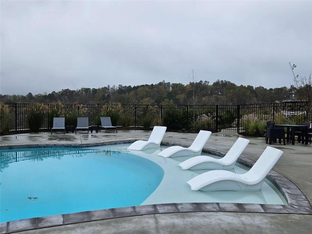 0 Canoe Way Talking Rock, GA 30175 - Photo 14 of 18 a view of a terrace with furniture