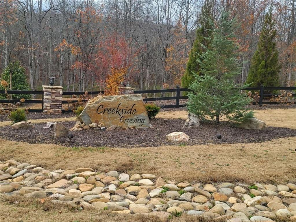 0 Canoe Way Talking Rock, GA 30175 - Photo 6 of 18 a view of a yard with wooden fence