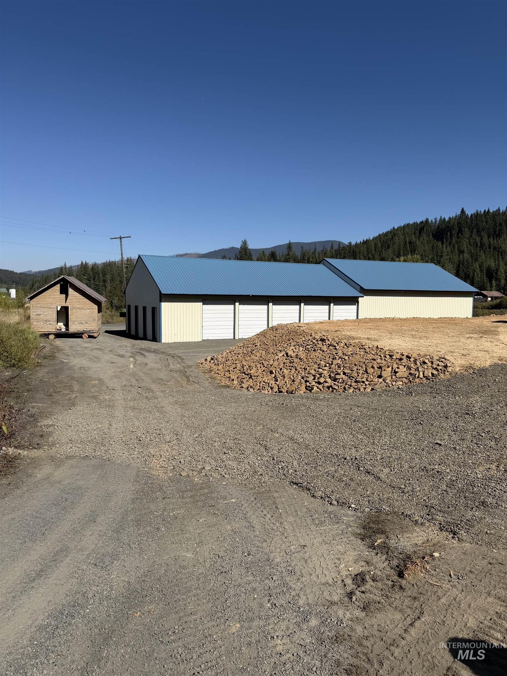 Tbd Dent Bridge Road Elk River, ID 83827 - Photo 16 of 23 Water view with an outbuilding and a forest