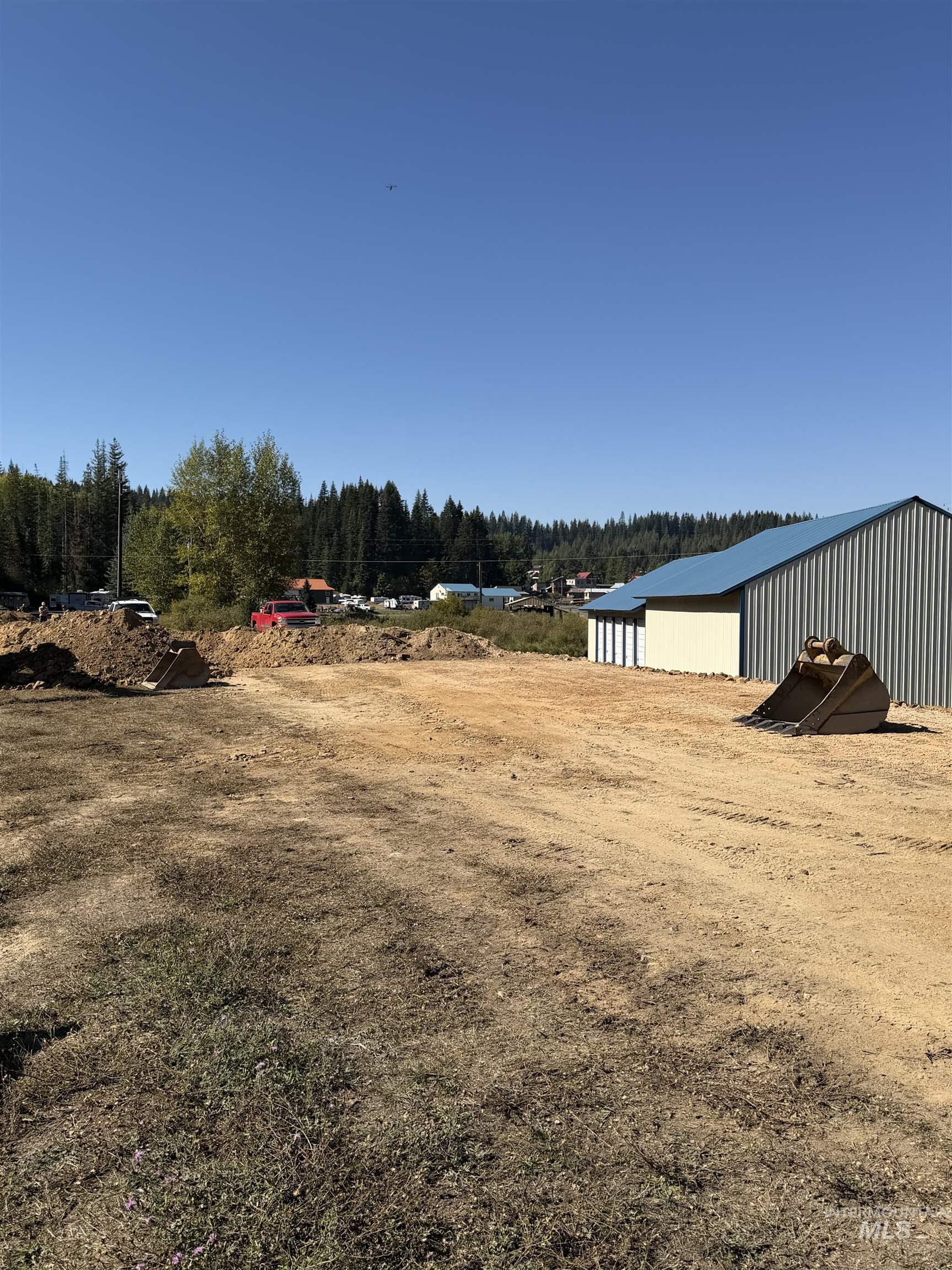 Tbd Dent Bridge Road Elk River, ID 83827 - Photo 9 of 23 View of yard with an outbuilding, an outdoor structure, and a wooded view