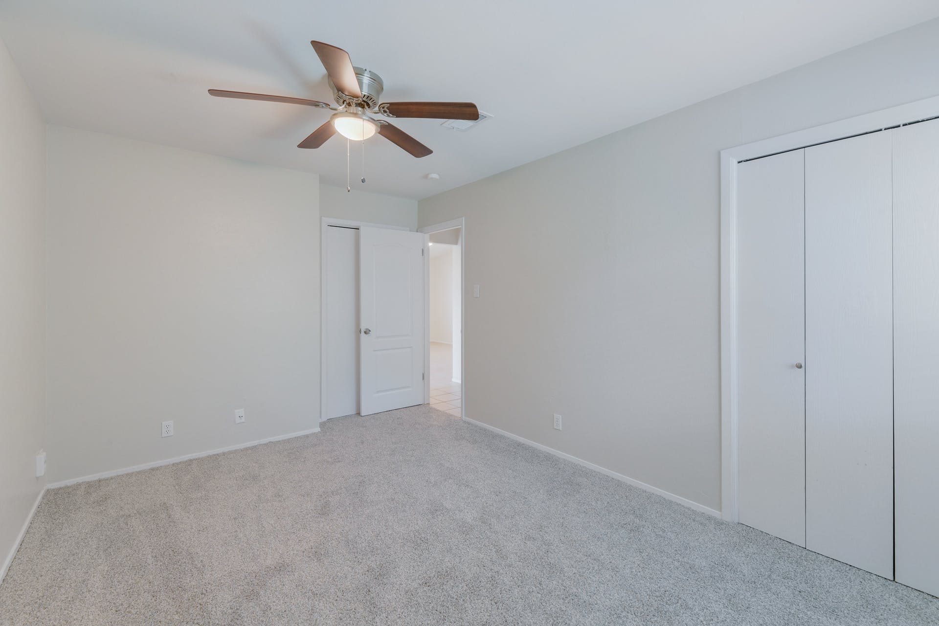 12603 Teague Trail, Unit B Austin, TX 78729 - Photo 11 of 14 a view of an empty room