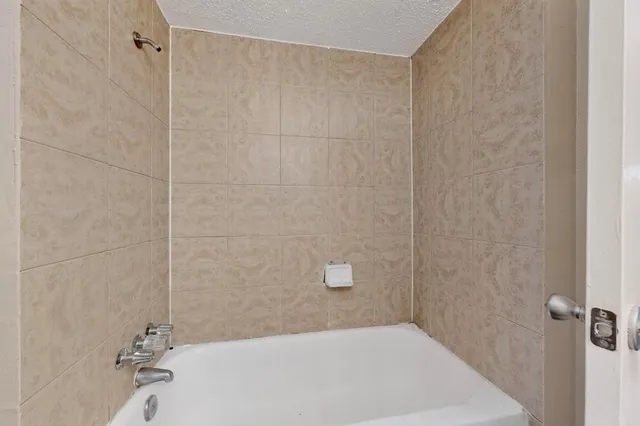 a bathroom with a bathtub