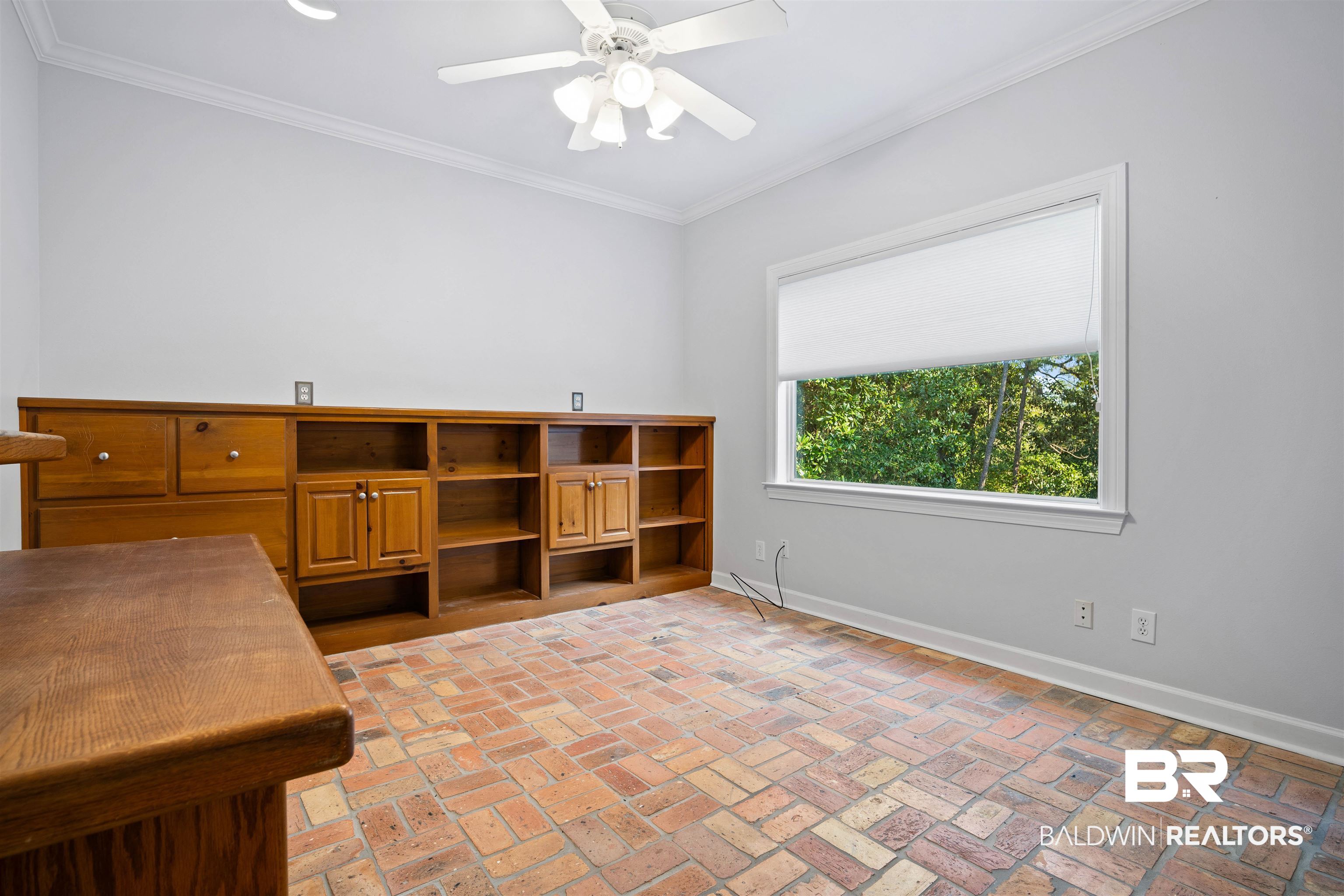 204 General Canby Loop Daphne, AL 36527 - Photo 14 of 36 Empty room featuring crown molding and ceiling fan