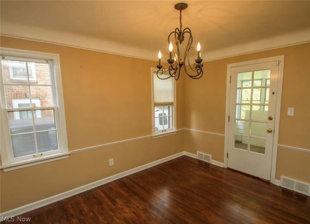 3563 Woodridge Road Cleveland Heights, OH 44121 - Photo 6 of 20 The Dining Room with glass pane door leading to the Sun Room