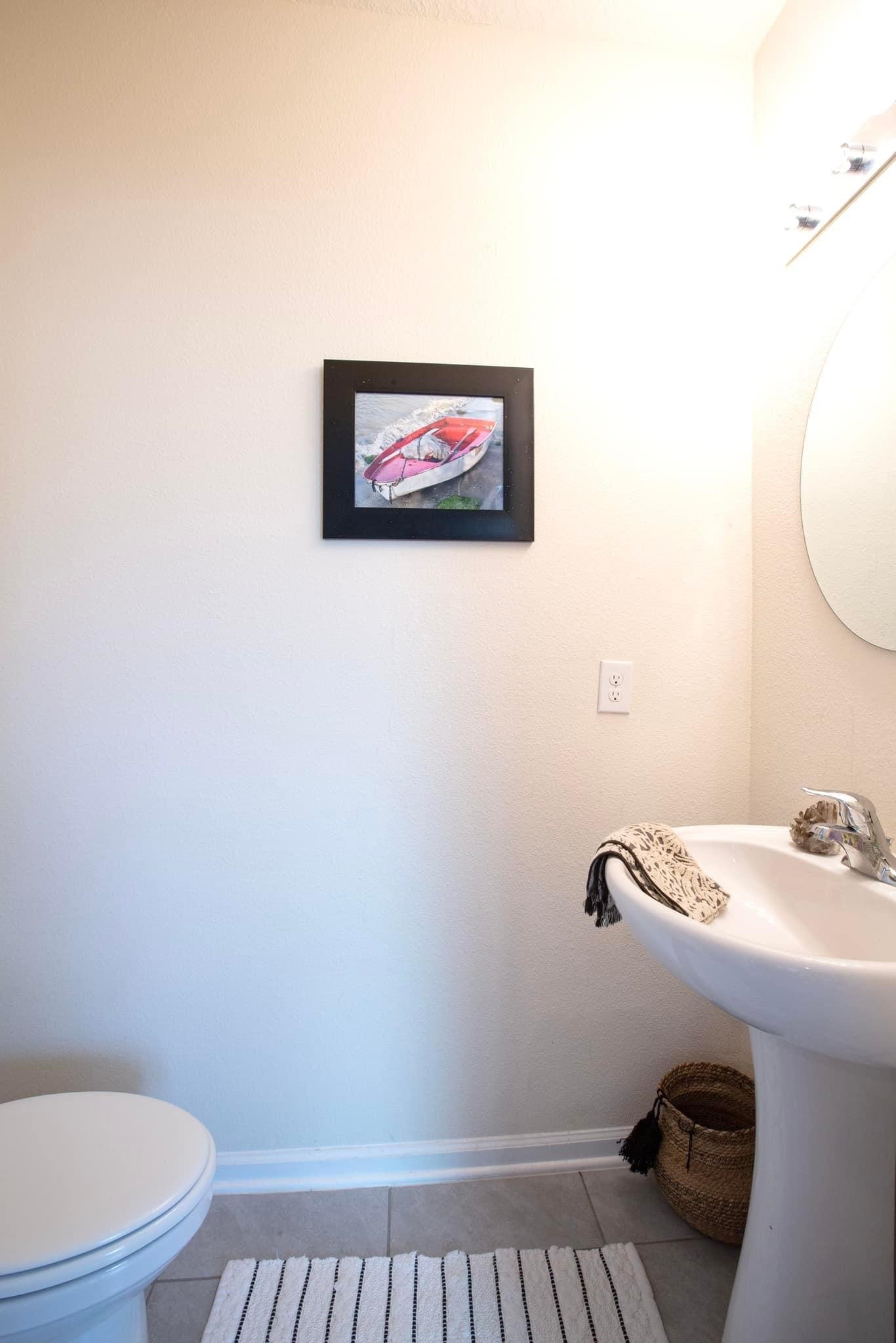 55 Crooked Branch Way Street St. Augustine, FL 32084 - Photo 9 of 11 a bathroom with a toilet and a sink