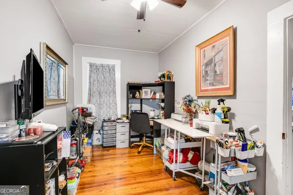 a kitchen with stainless steel appliances kitchen island granite countertop a stove a sink dishwasher and a microwave oven with cabinets