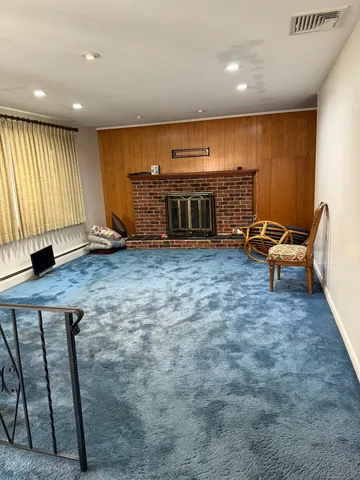 a kitchen with a sink a stove and cabinets
