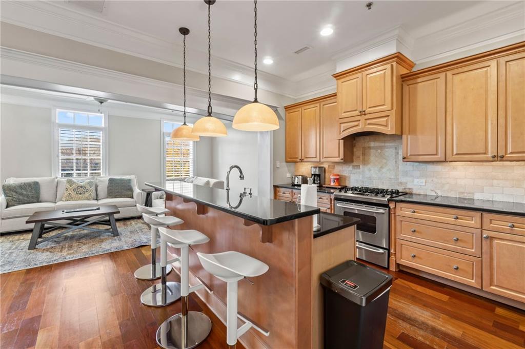 3 Buford Village Way Buford, GA 30518 - Photo 13 of 40 a kitchen with sink cabinets and outdoor living space