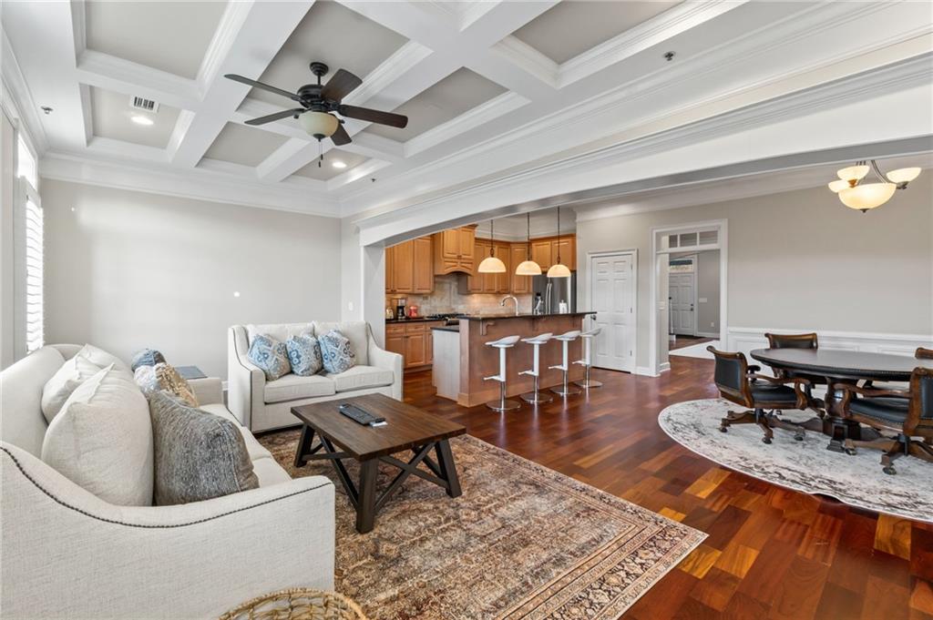 3 Buford Village Way Buford, GA 30518 - Photo 21 of 40 a living room with furniture and a large window