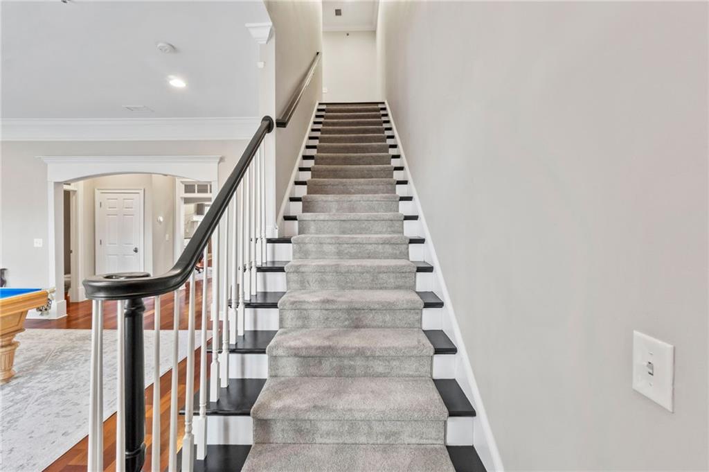 3 Buford Village Way Buford, GA 30518 - Photo 22 of 40 a view of entryway and hall with wooden floor