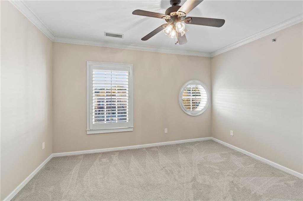 3 Buford Village Way Buford, GA 30518 - Photo 31 of 40 a view of an empty room with a window