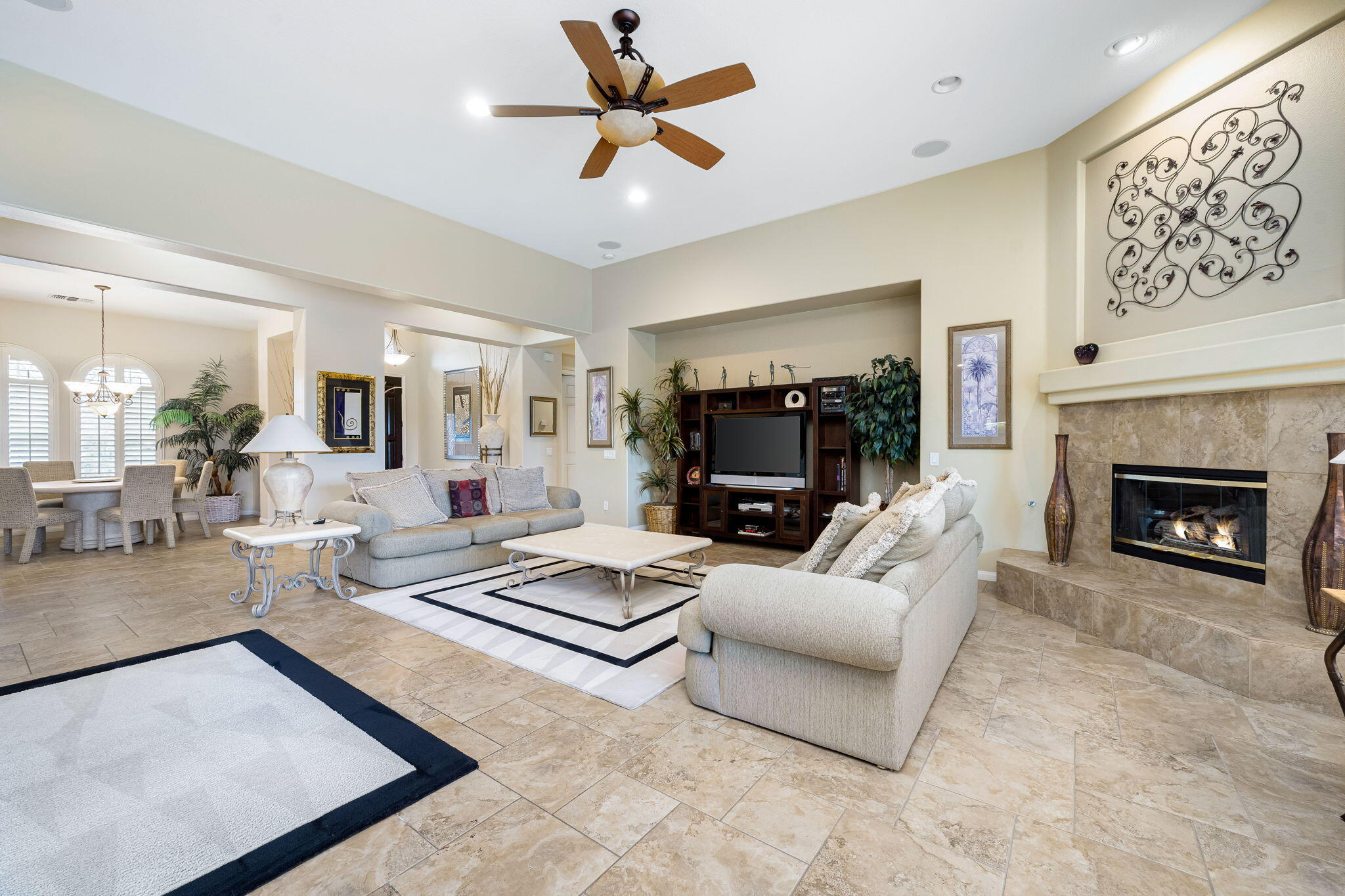80262 Amazon Indio, CA 92201 - Photo 11 of 45 a living room with furniture and a fireplace