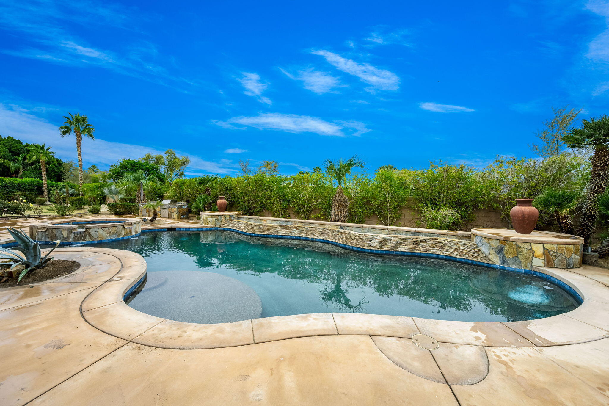 80262 Amazon Indio, CA 92201 - Photo 14 of 45 a view of a swimming pool with a patio