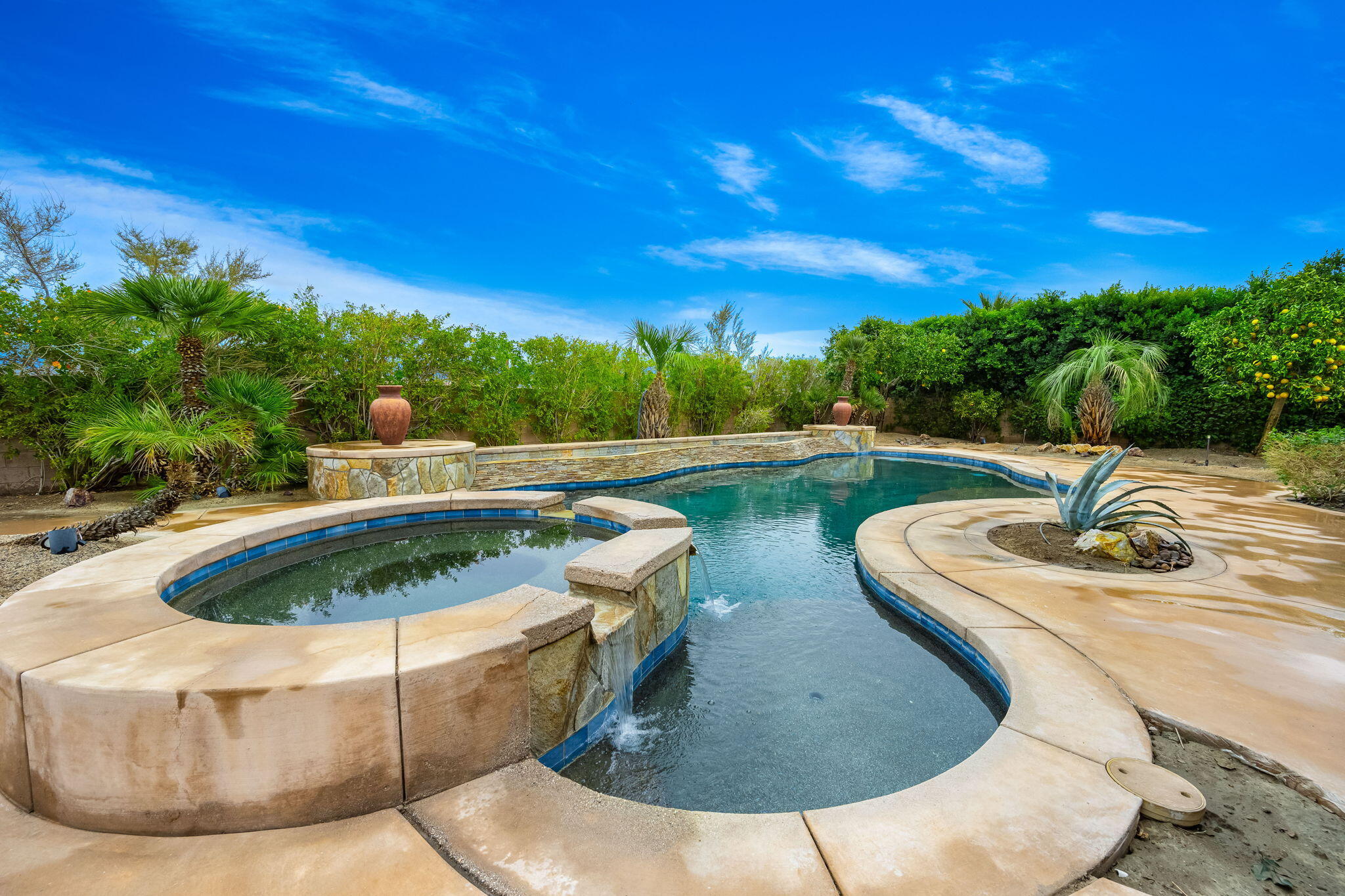 80262 Amazon Indio, CA 92201 - Photo 22 of 45 a view of a swimming pool in the backyard