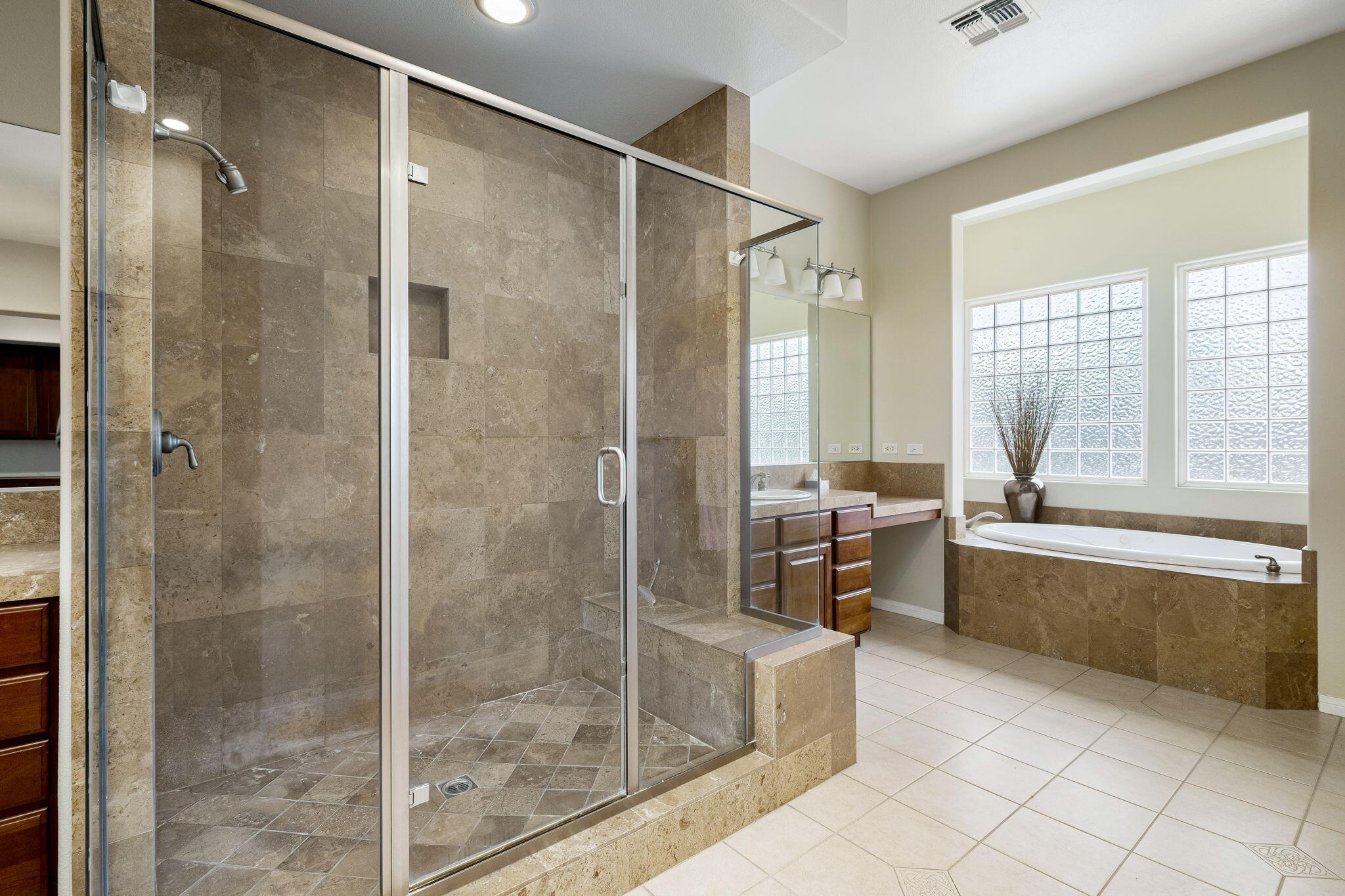 80262 Amazon Indio, CA 92201 - Photo 36 of 45 a bathroom with a large mirror shower and bathtub