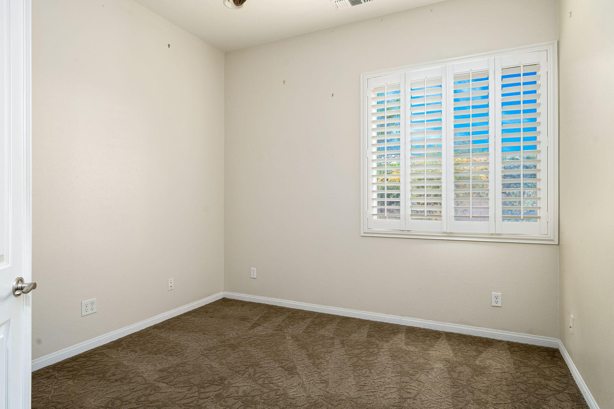 80262 Amazon Indio, CA 92201 - Photo 38 of 45 an empty room with a window