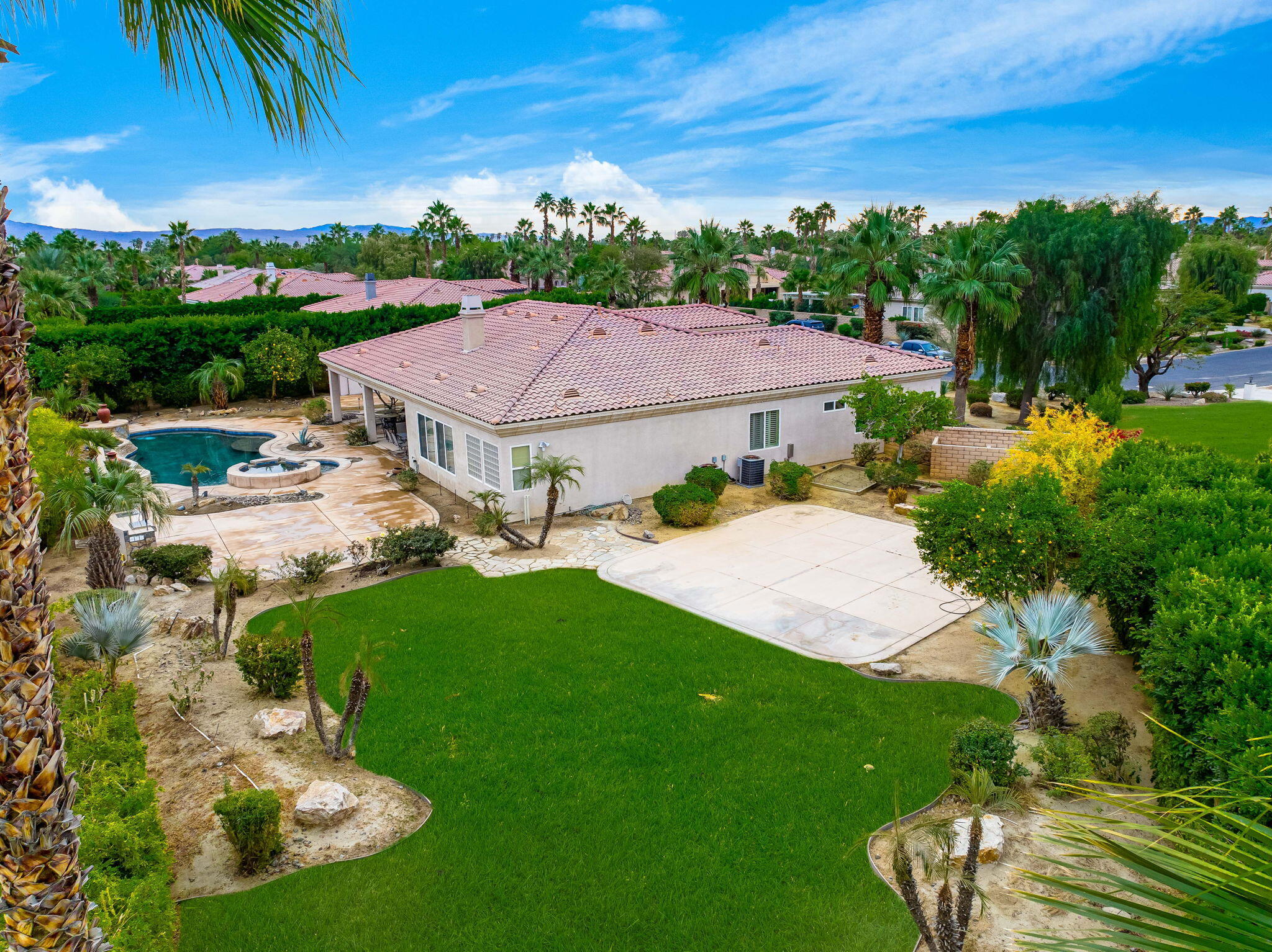 80262 Amazon Indio, CA 92201 - Photo 4 of 45 a aerial view of a house with garden space and street view