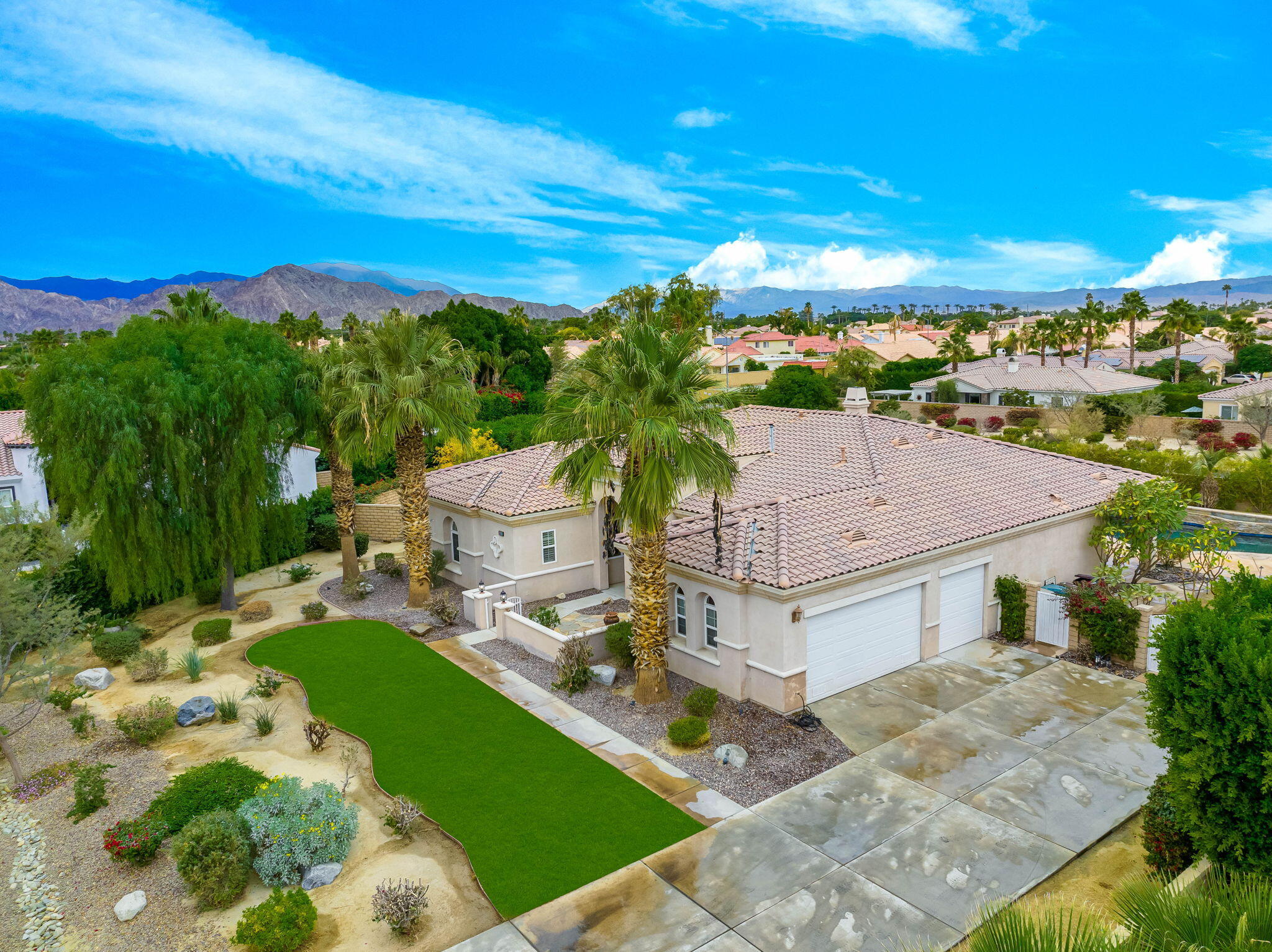 80262 Amazon Indio, CA 92201 - Photo 6 of 45 a aerial view of a house with garden space and street view