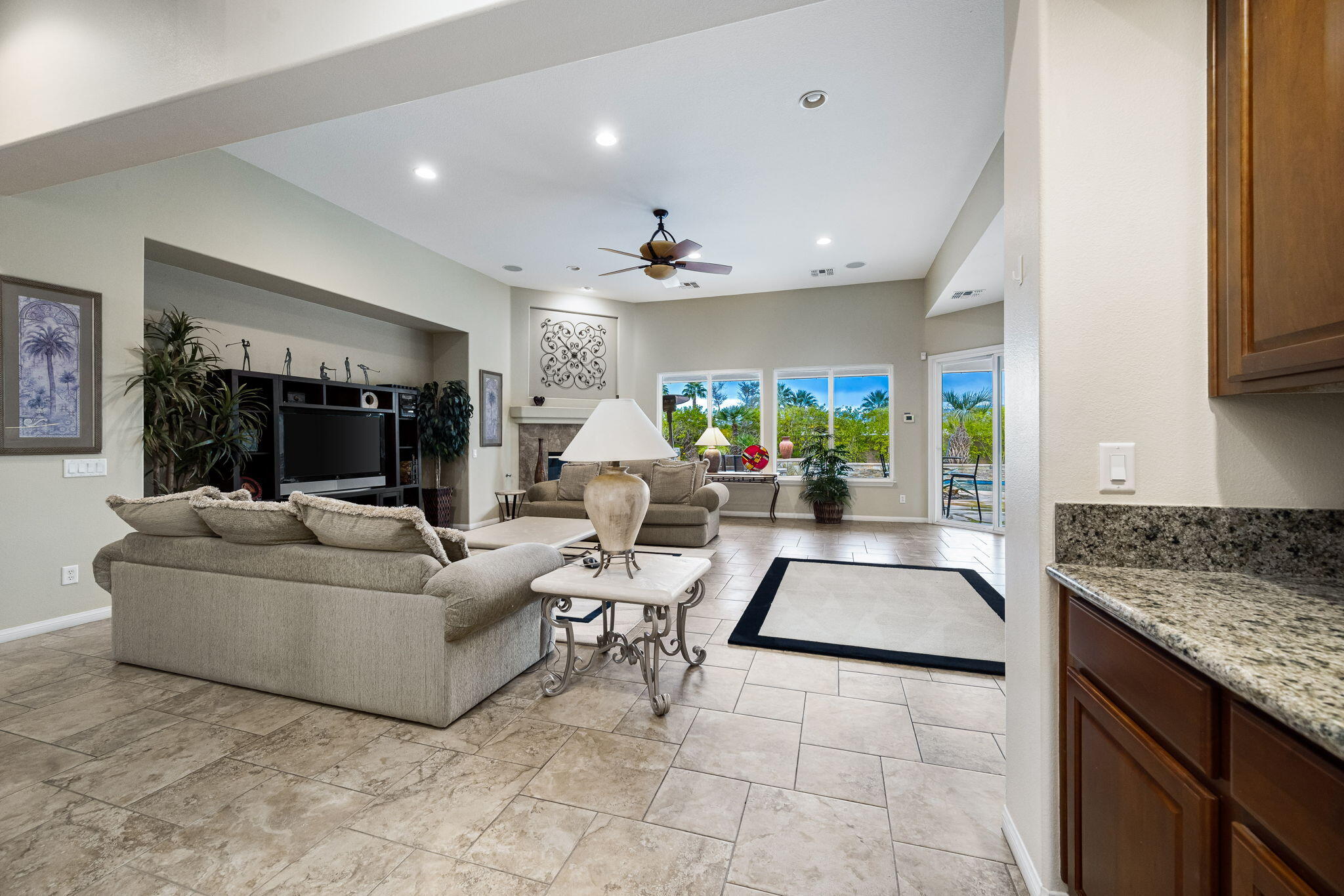 80262 Amazon Indio, CA 92201 - Photo 9 of 45 a living room with furniture and a chandelier