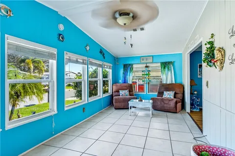 a lobby with furniture and window