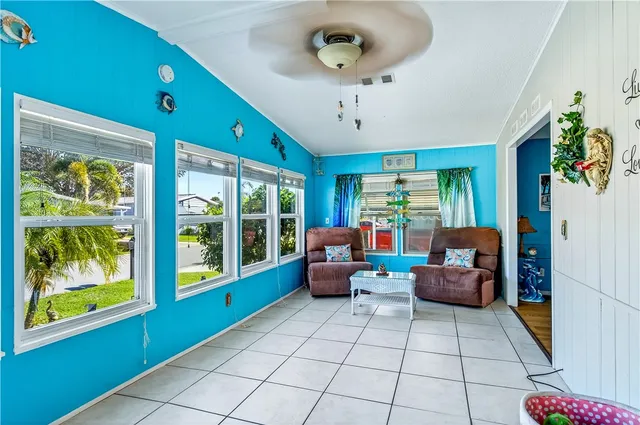 a lobby with furniture and window