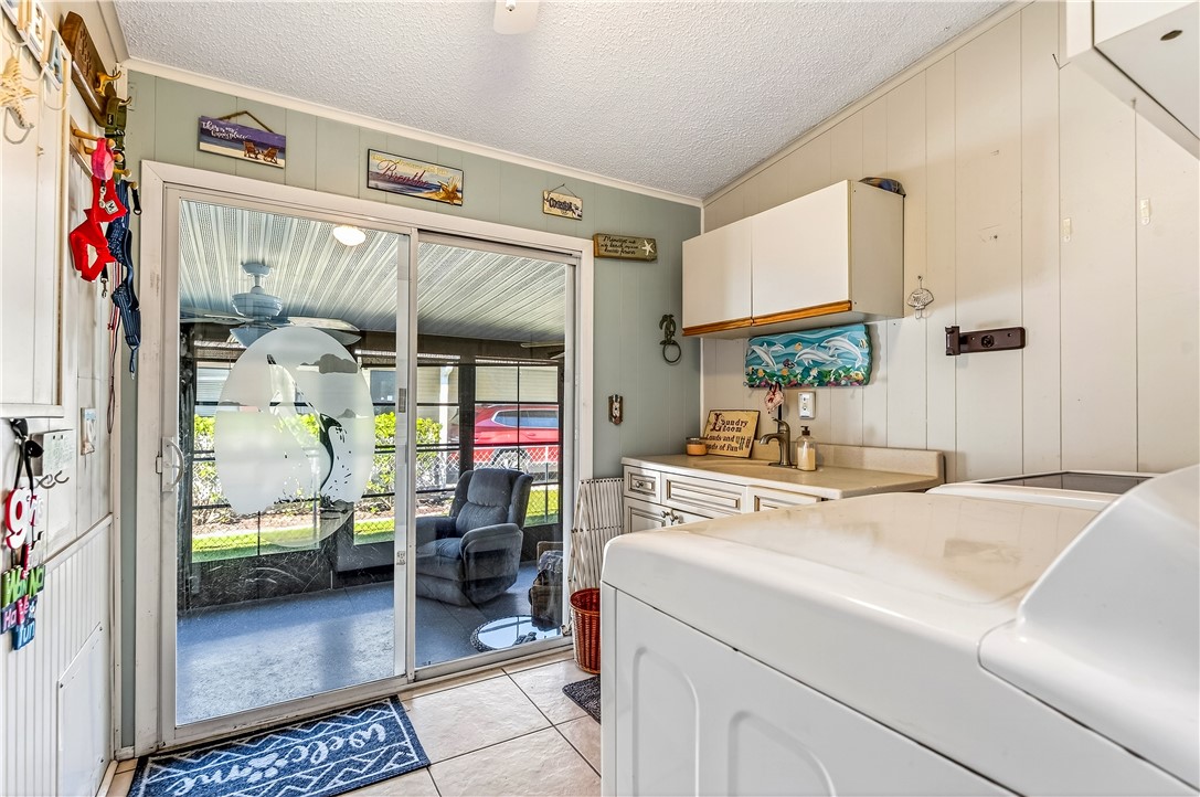 717 Wedelia Drive Sebastian, FL 32976 - Photo 17 of 24 a room with storage and utility