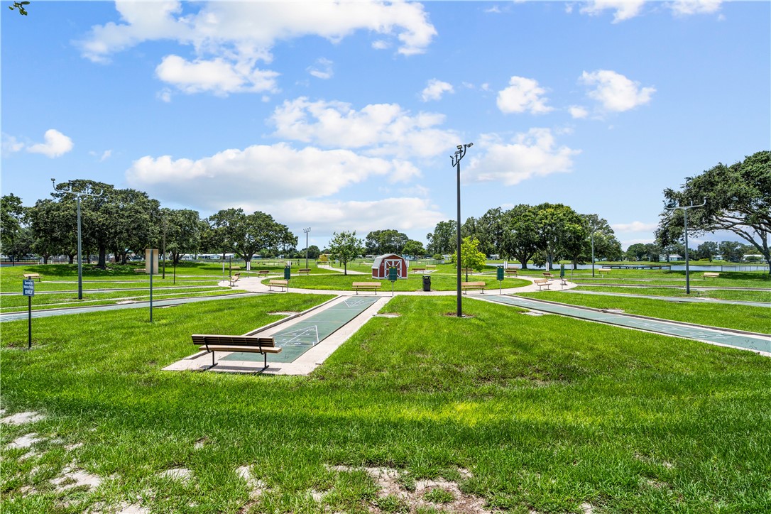717 Wedelia Drive Sebastian, FL 32976 - Photo 21 of 24 a view of a park with a big yard