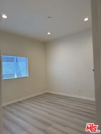 a bathroom with a toilet a sink and a shower