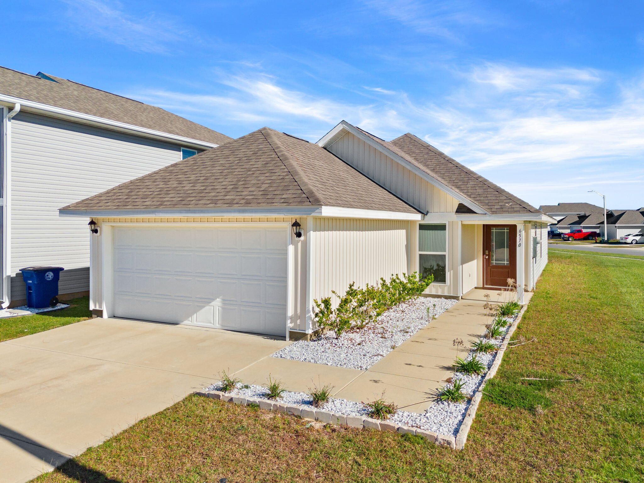 6570 Atkins Road Panama City, FL 32404 - Photo 1 of 50 a view of a house with a patio