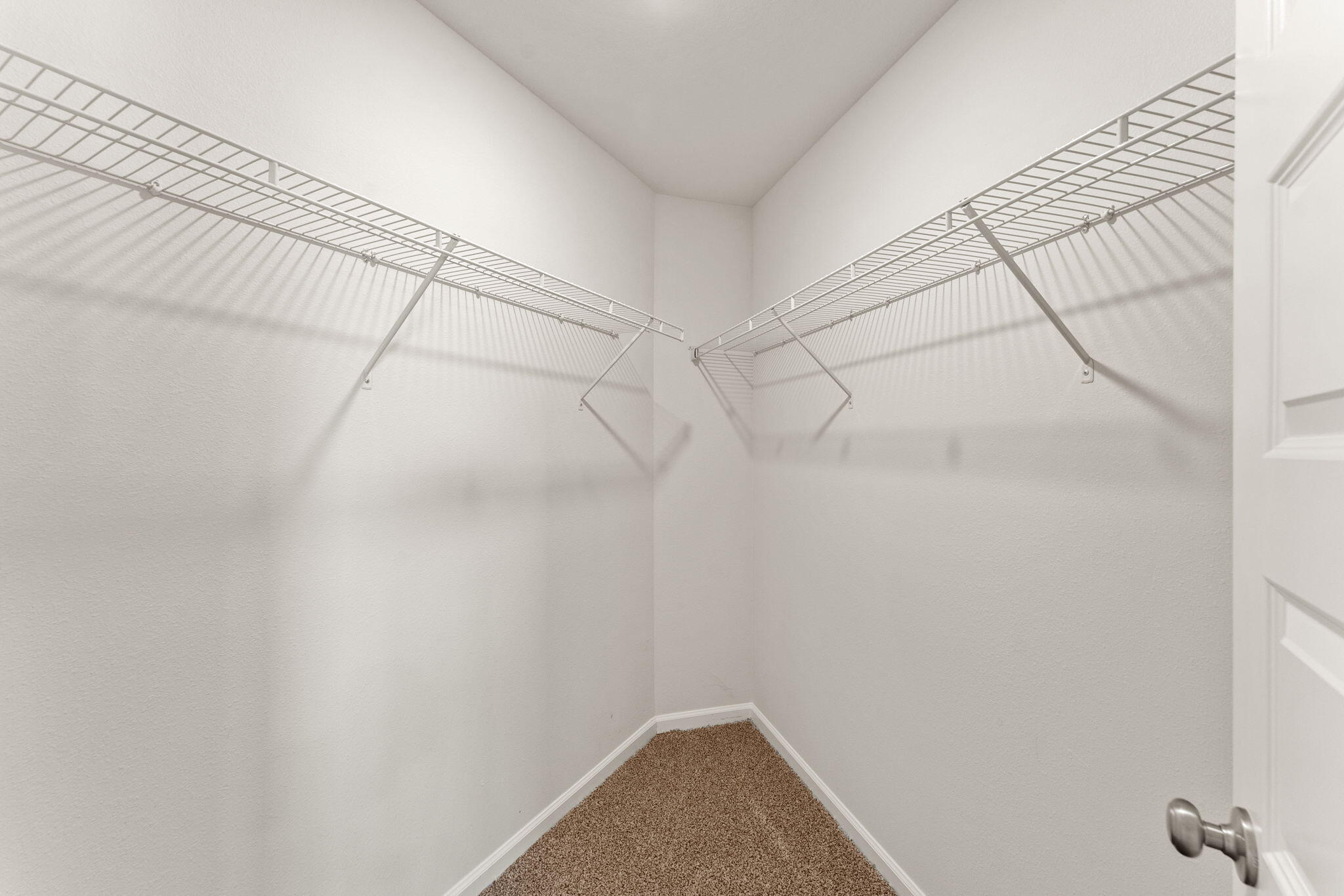 6570 Atkins Road Panama City, FL 32404 - Photo 25 of 50 a view of a room with racks on the wall