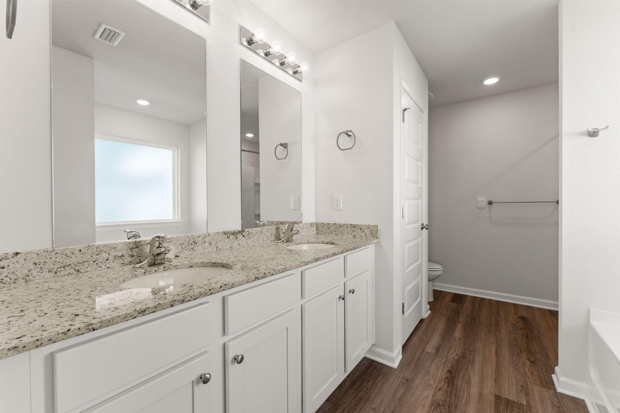 6570 Atkins Road Panama City, FL 32404 - Photo 26 of 50 a bathroom with a granite countertop sink a mirror and a