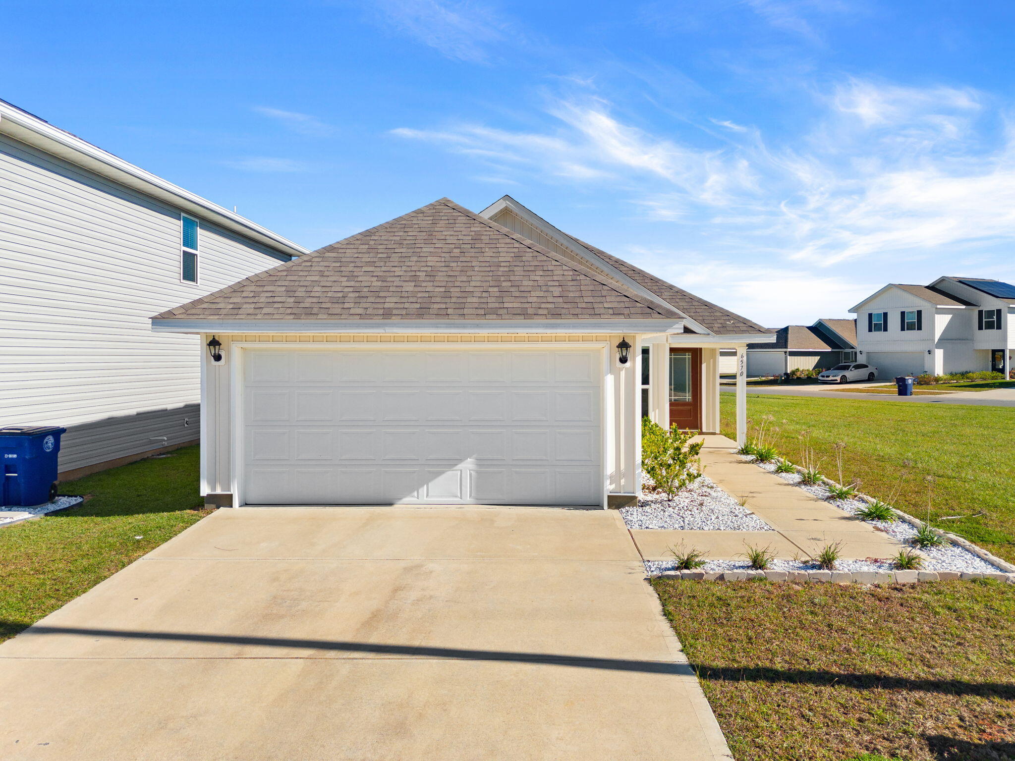 6570 Atkins Road Panama City, FL 32404 - Photo 3 of 50 a view of a house with a yard