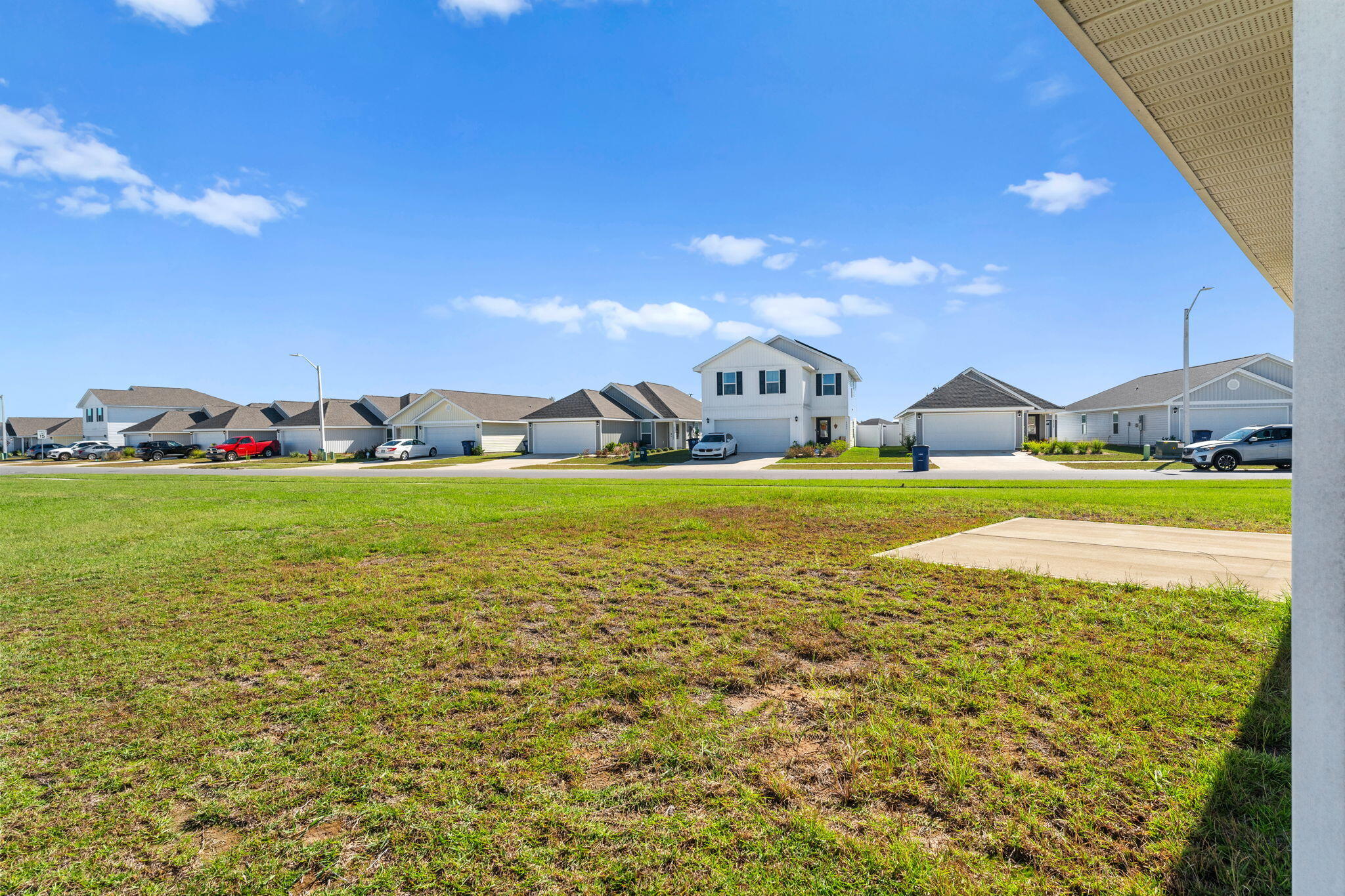 6570 Atkins Road Panama City, FL 32404 - Photo 31 of 50 a view of a swimming pool with a yard