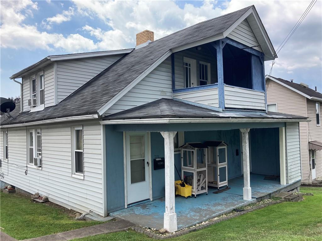 36 Lincoln Avenue, Unit 3 Irwin, PA 15642 - Photo 2 of 22 a view of house with a yard and porch