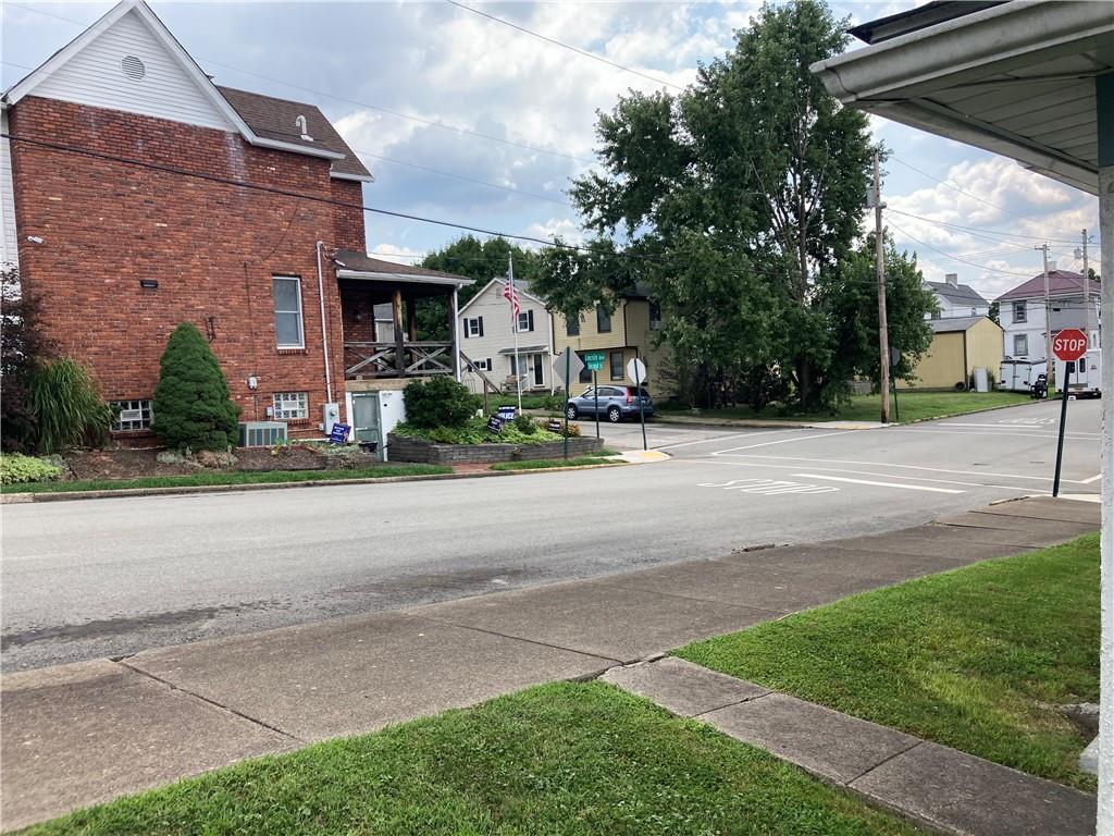 36 Lincoln Avenue, Unit 3 Irwin, PA 15642 - Photo 22 of 22 a front view of a house with a yard