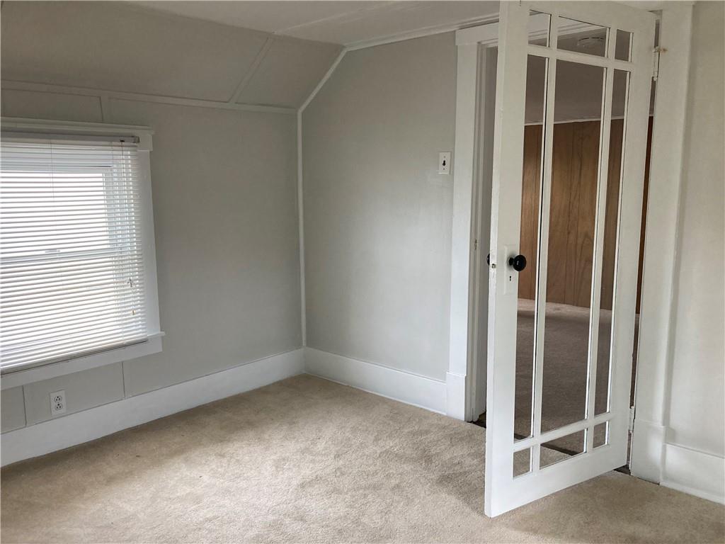 36 Lincoln Avenue, Unit 3 Irwin, PA 15642 - Photo 8 of 22 an empty room with windows